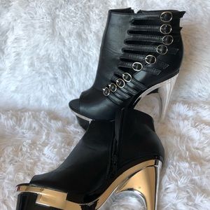 Size 9, black and silver heel